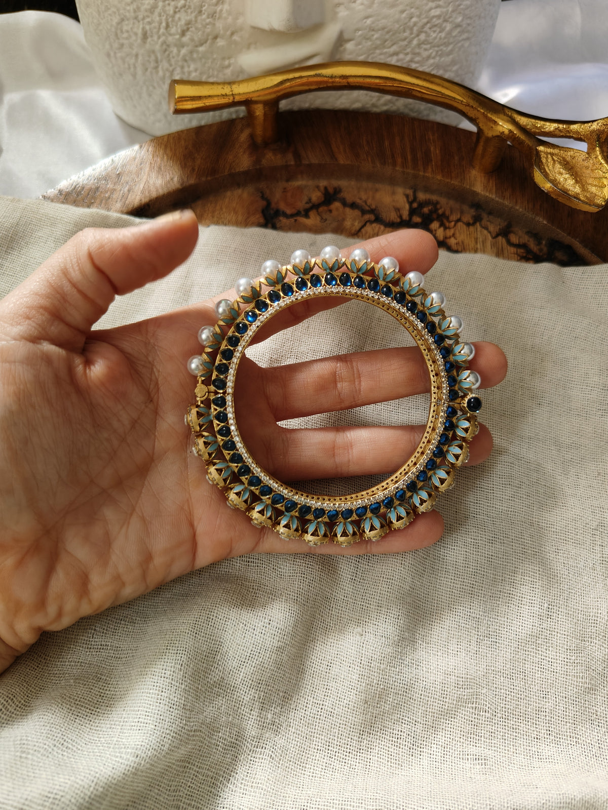 Blue polki bangle detail with uncut stones and pearls